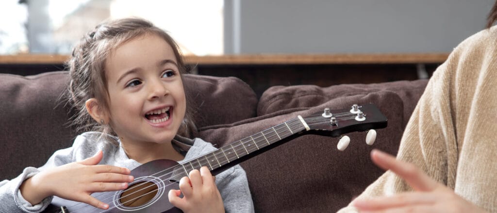 gitaarles voor kinderen, stock foto